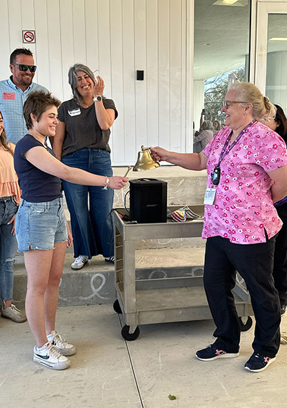Emma gets to ring the bell